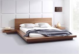 Giường ngủ sử dụng chất liệu gỗ công nghiệp MDF phủ Veneer